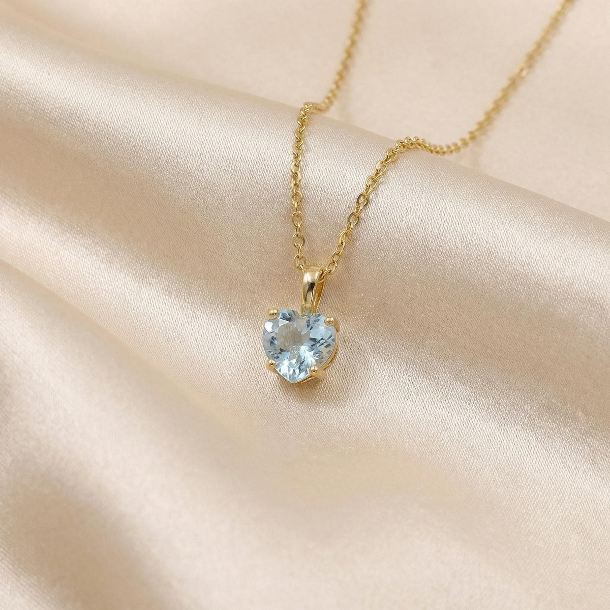 Close up heart shaped aquamarine pendant necklace