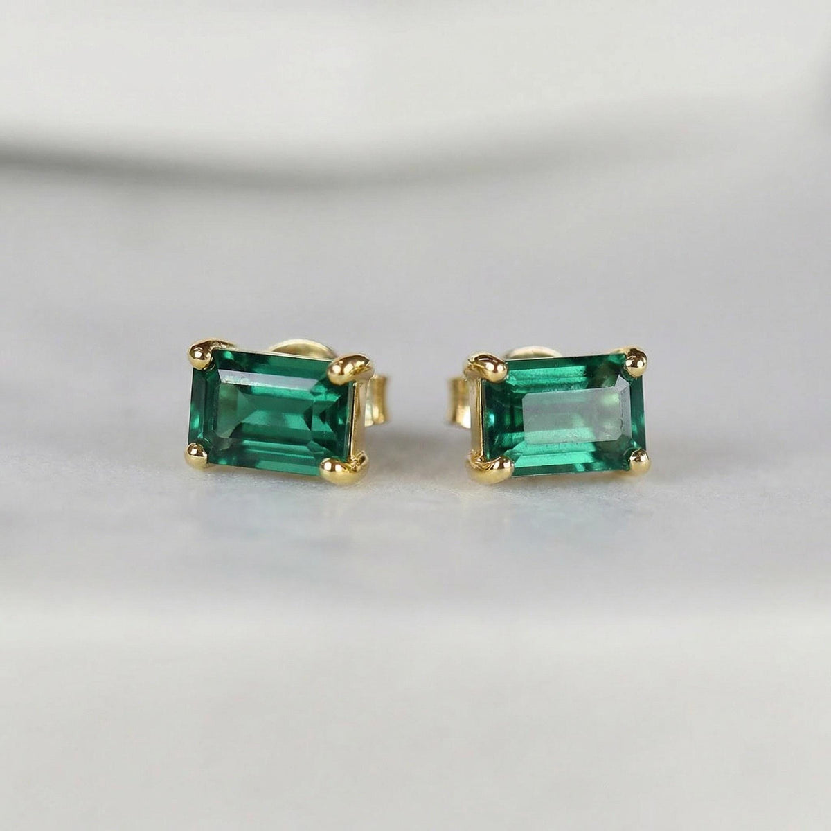 Genuine emerald stud earrings in 14k gold, emerald cut May birthstone jewelry.