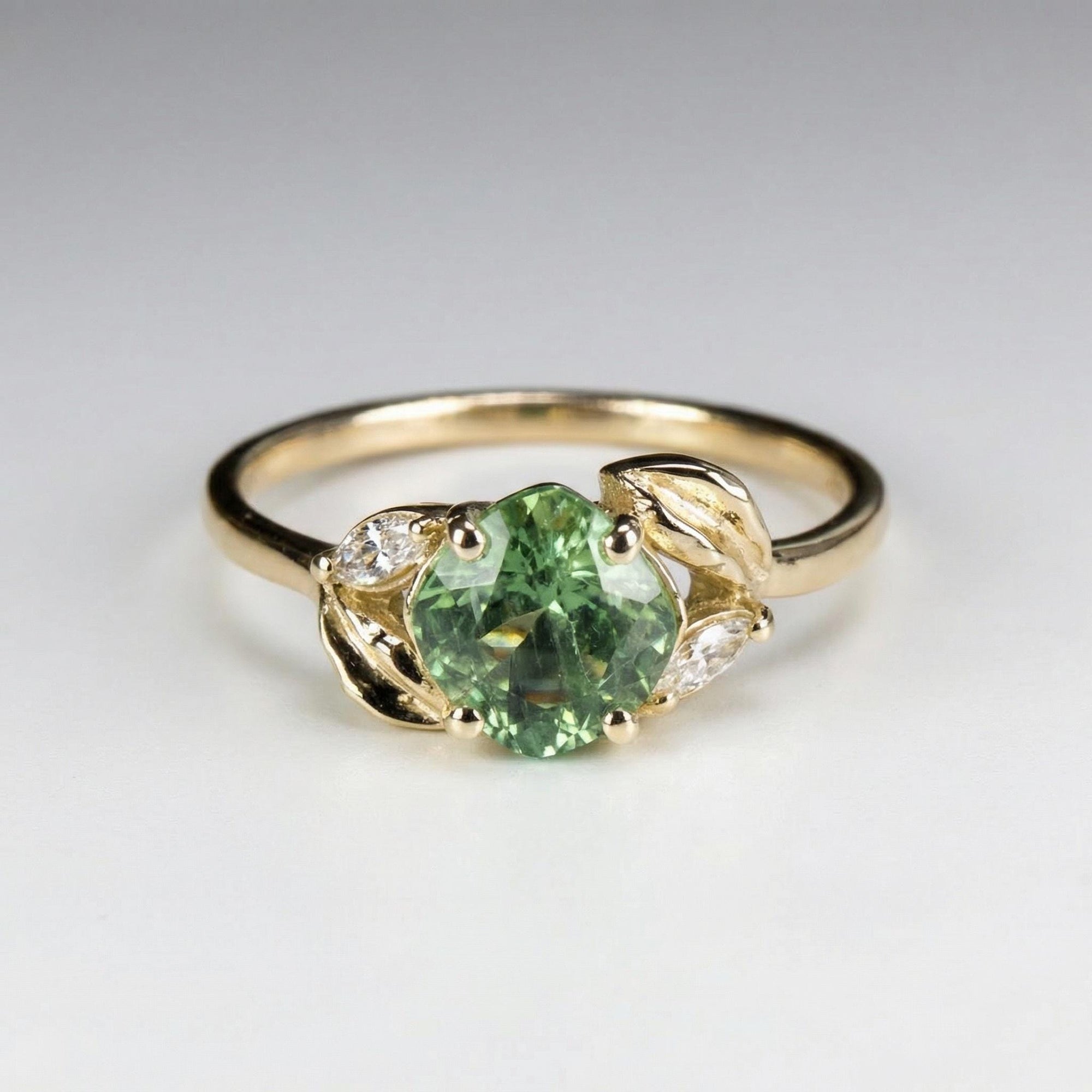 14k solid gold prasiolite cushion cut engagement ring with marquise diamond accent and leaf decorated nature inspired design