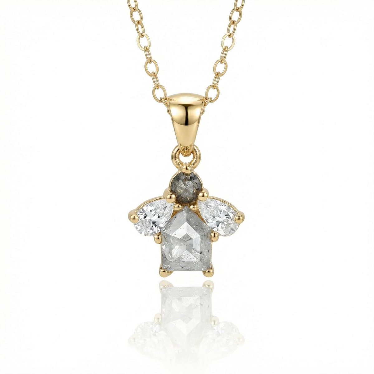14k solid gold cluster necklace featuring a center rose cut salt and pepper diamond surrounded by pear-shaped moissanites on a white background.