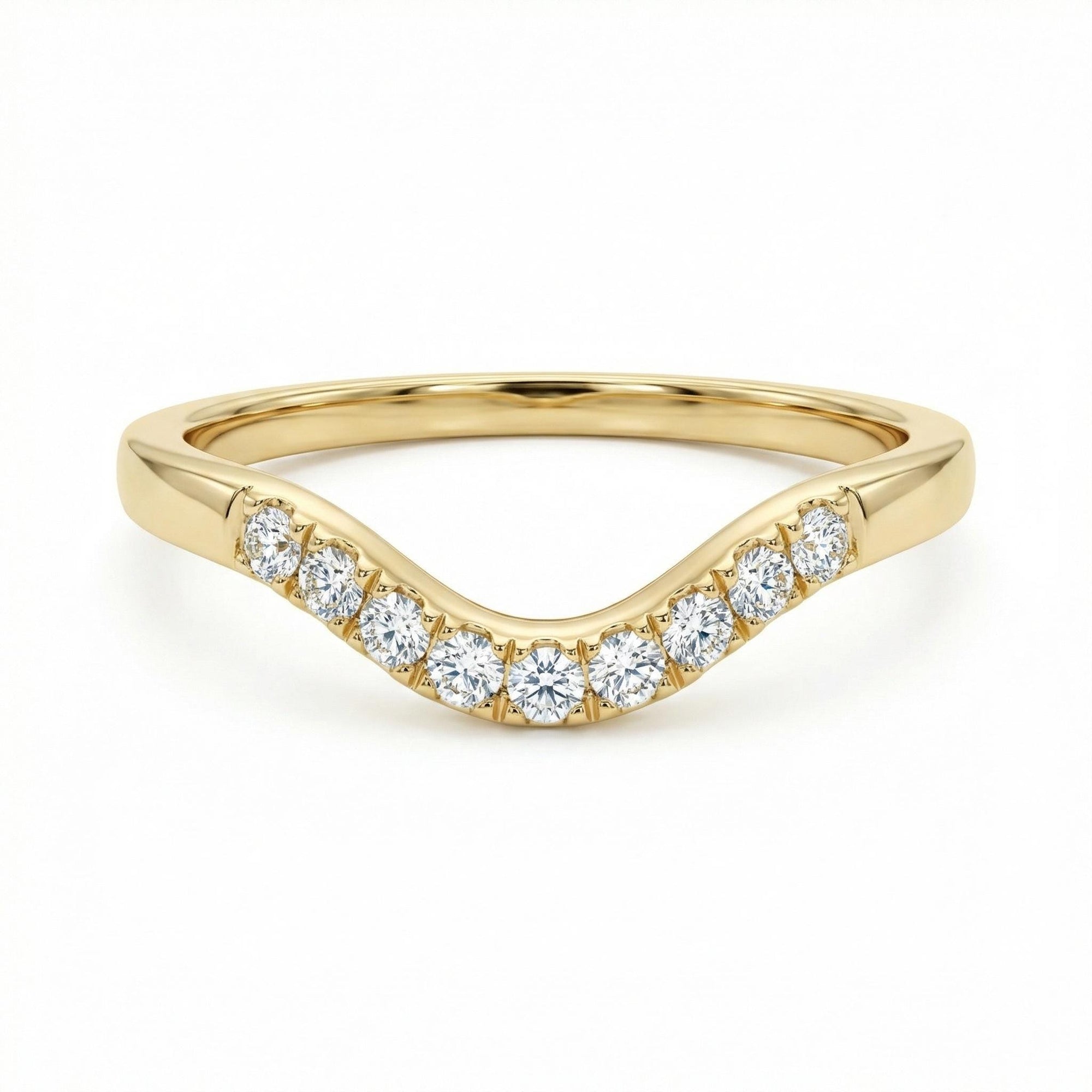 Curved diamond wedding band in 14k gold, organic contour half eternity ring flat lay on neutral background