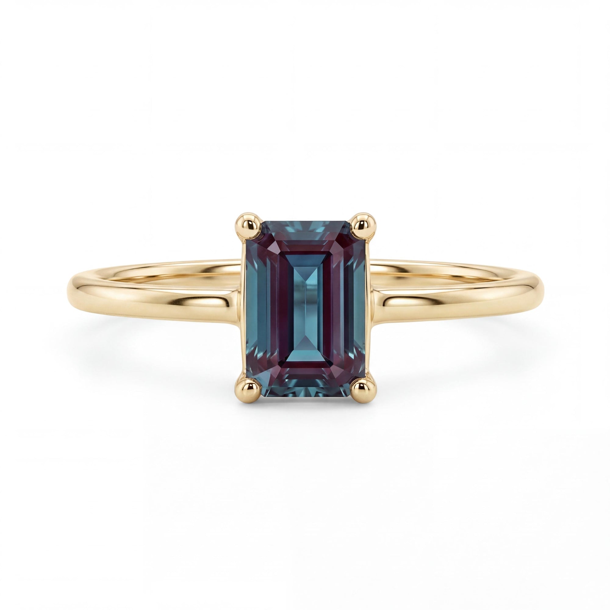 Handmade 14k gold emerald cut alexandrite engagement ring, featuring the June birthstone, perfect for anniversaries and birthday gifts