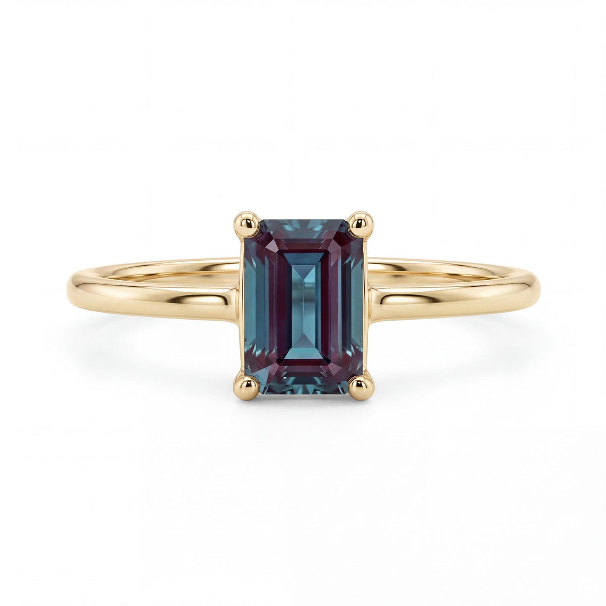Handmade 14k gold emerald cut alexandrite engagement ring, featuring the June birthstone, perfect for anniversaries and birthday gifts