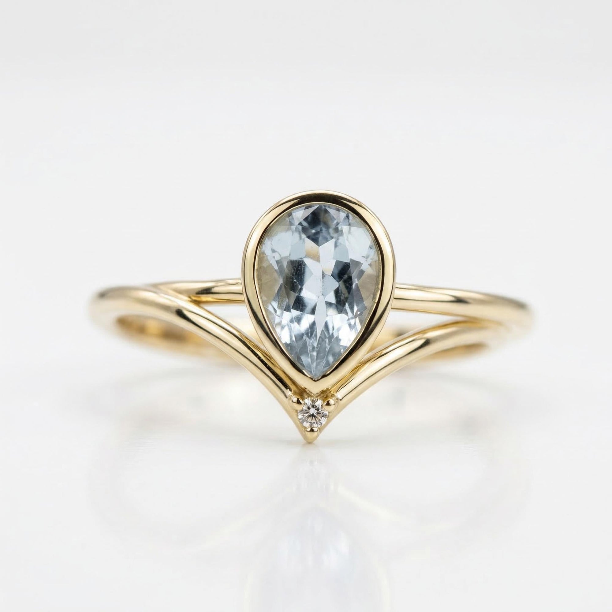 Bezel Set Pear Cut Aquamarine Ring in 14k Gold