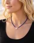 Lapis Lazuli Rondelle Necklace on Red Silk, 4.5mm Hand Knotted Strand with Sterling Silver Fish Star Clasp