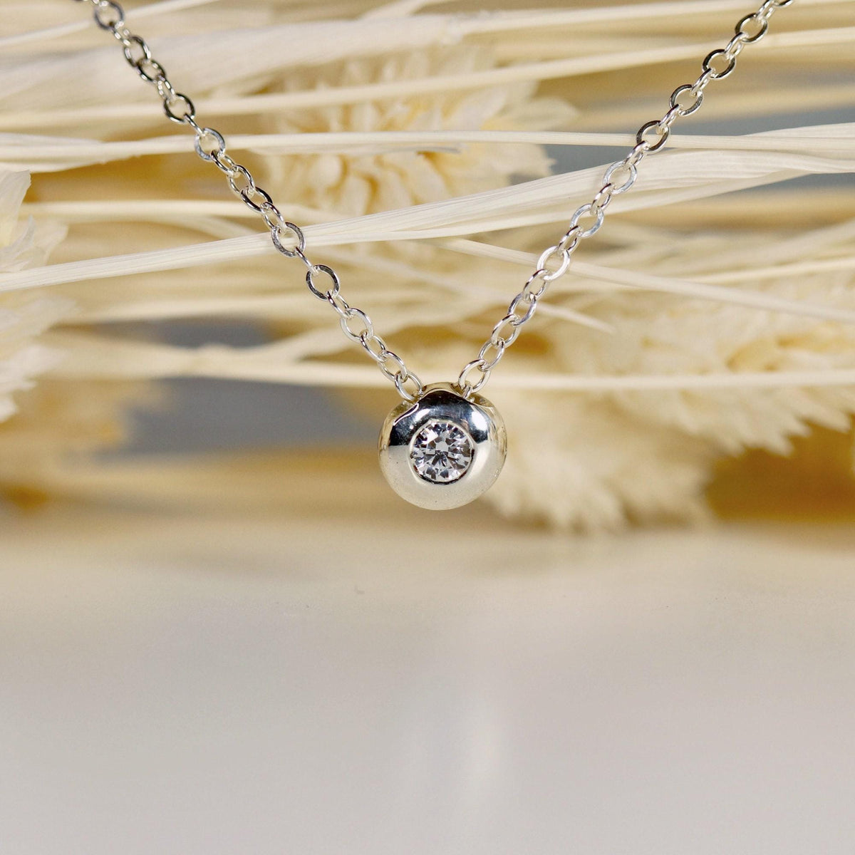 Sterling Silver Floating CZ Pebble Necklace - Melt'm Jewelry