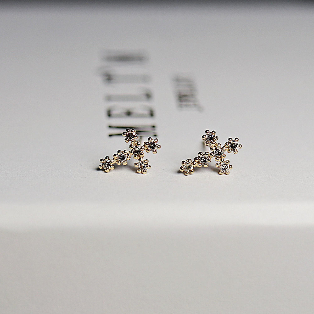 Tiny Cross Diamond Earrings in 14k Gold (SINGLE OR PAIR) - Melt'm Jewelry