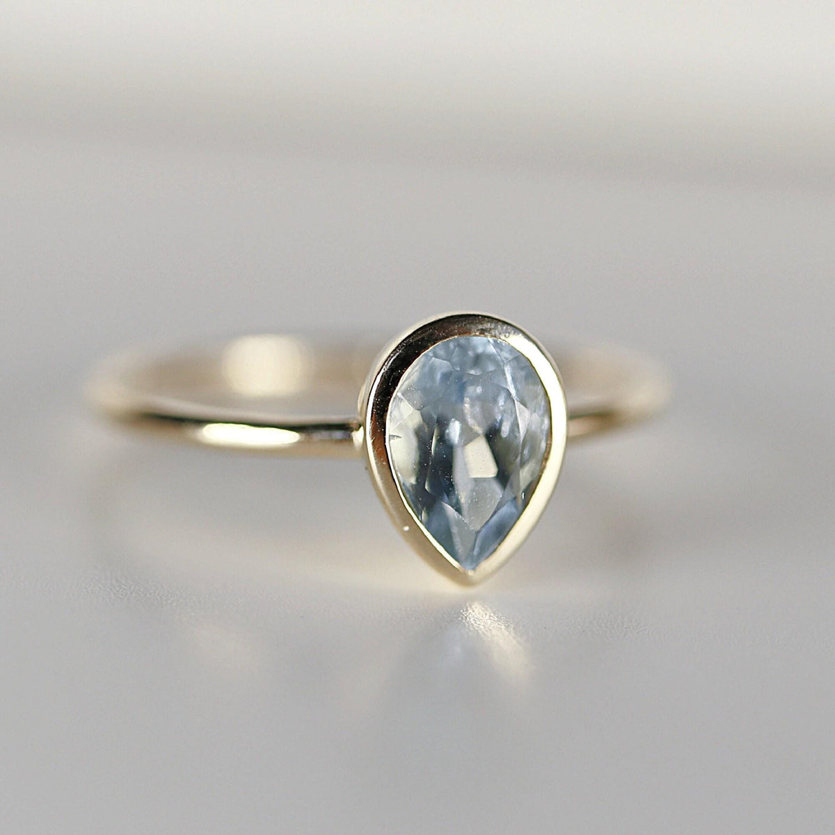 Bezel Set Pear Cut Aquamarine Ring in 14k Gold - Melt'm Jewelry