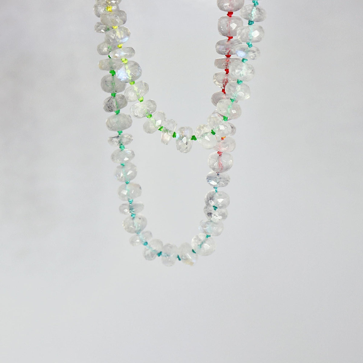 Hand Knotted Rondelle Moonstone Necklace on Rainbow Silk, Gold Filled Figure Eight Charm Holder - Melt'm Jewelry