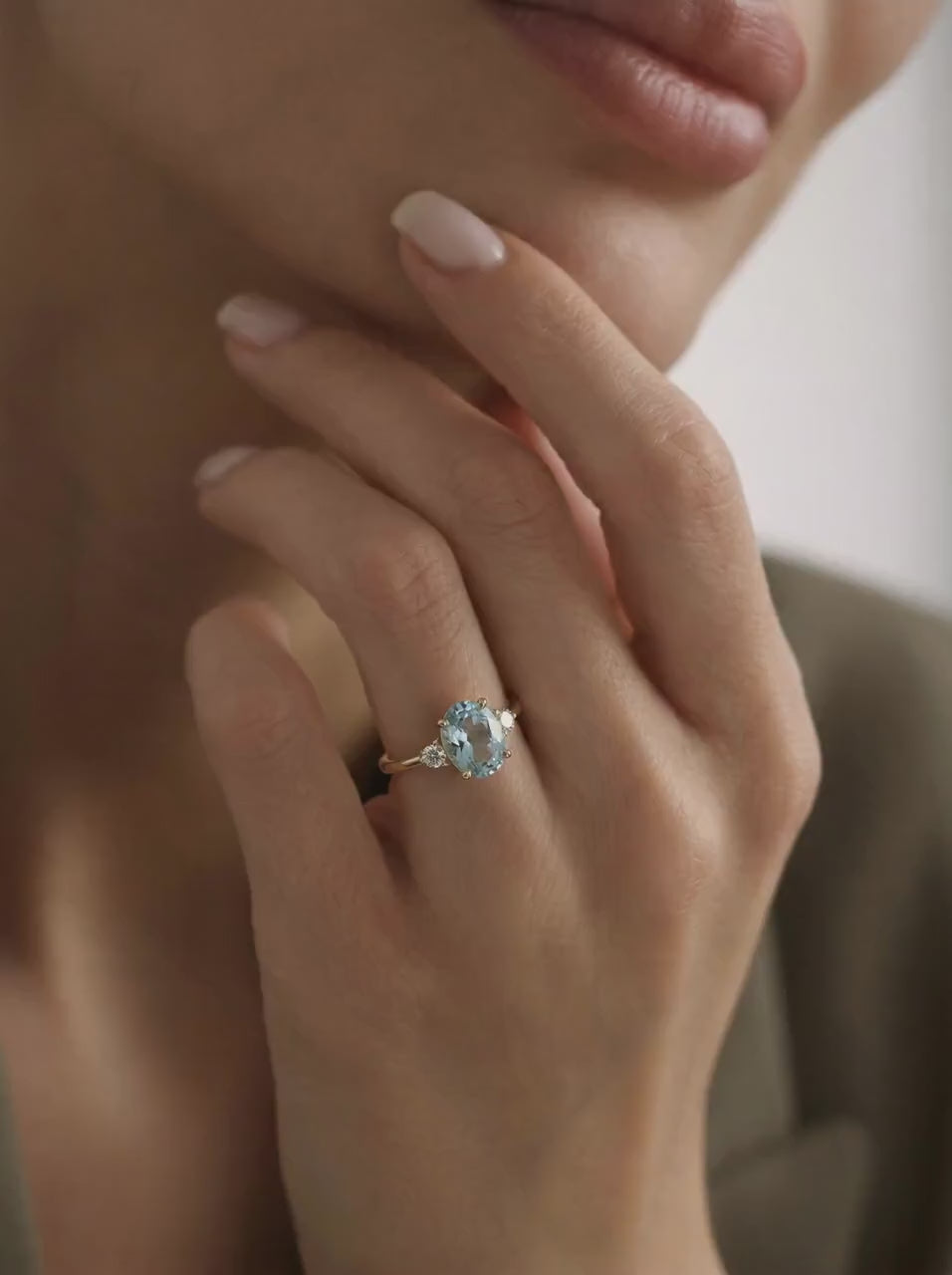 Oval Aquamarine Engagement Ring with two Accent Diamonds