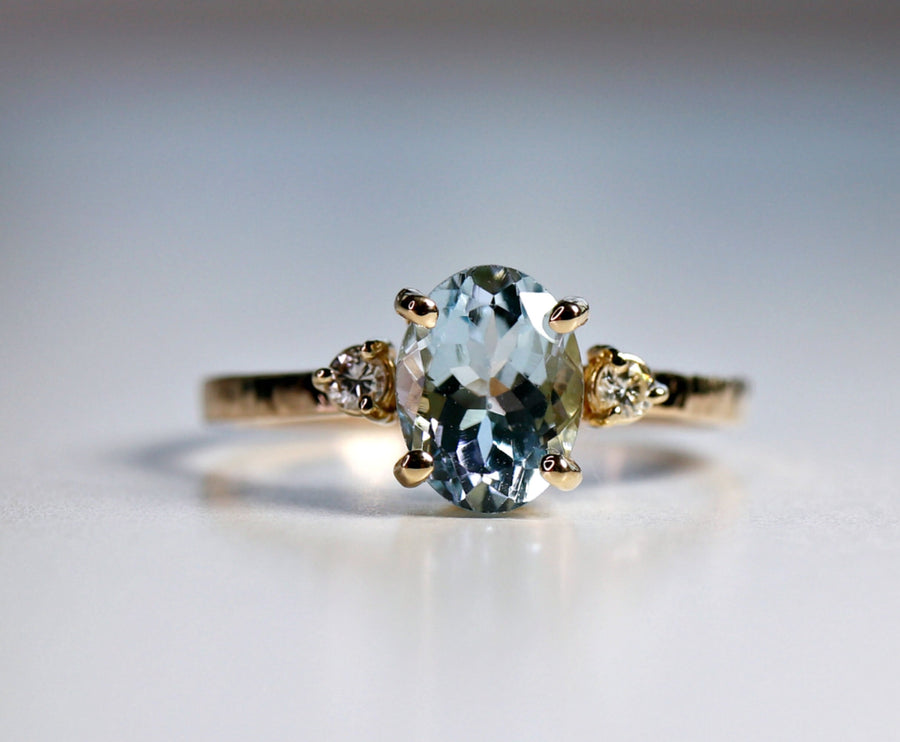 Oval Aquamarine Engagement Ring with two Accent Diamonds