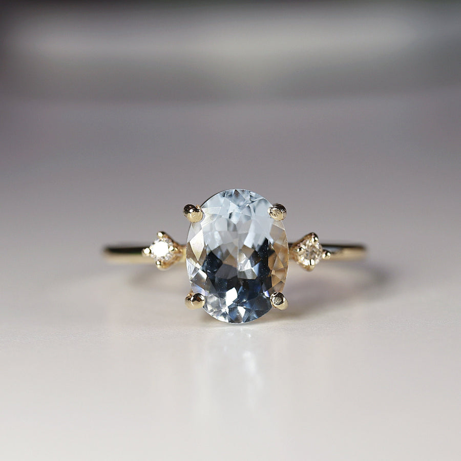 Oval Aquamarine Engagement Ring with two Accent Diamonds