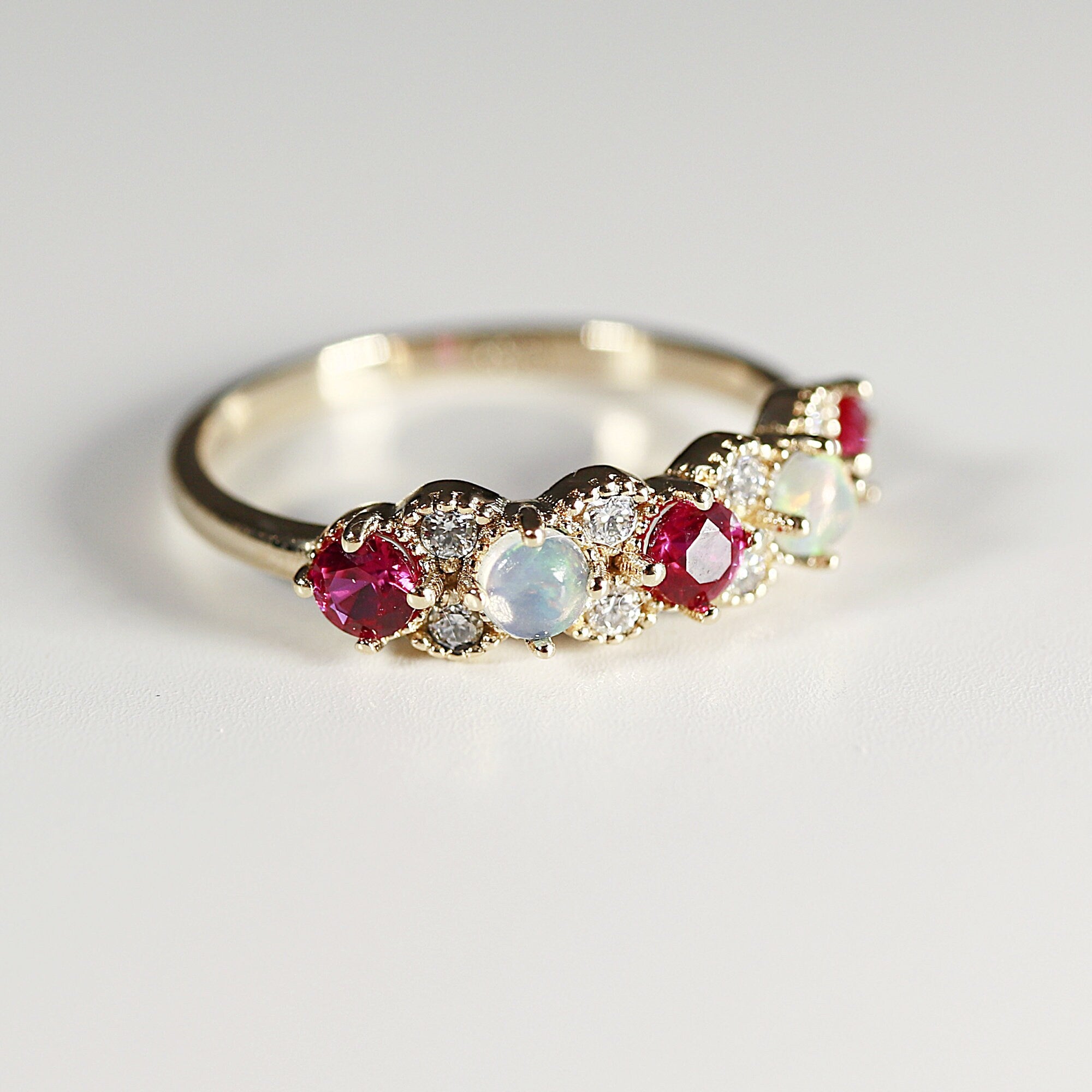 Opal, Ruby and Diamond Half Eternity Ring