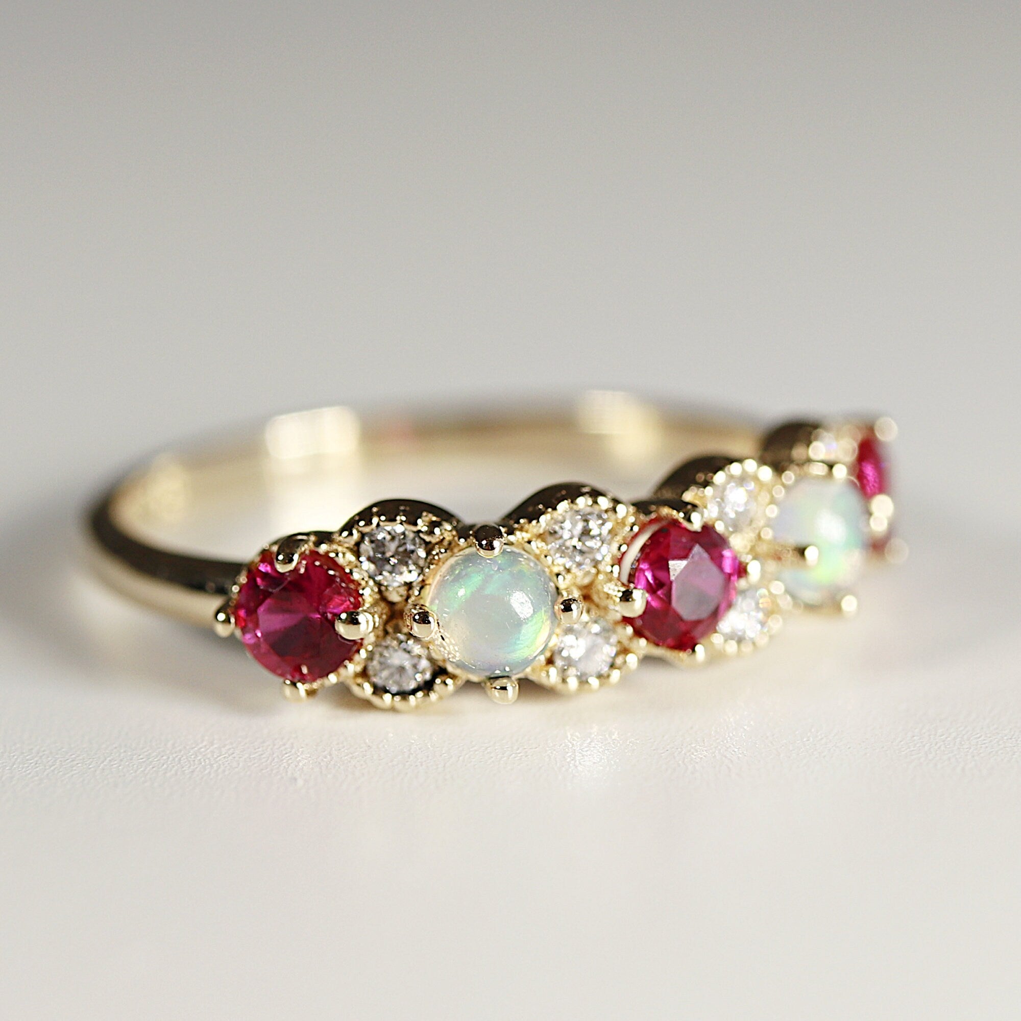 Opal, Ruby and Diamond Half Eternity Ring