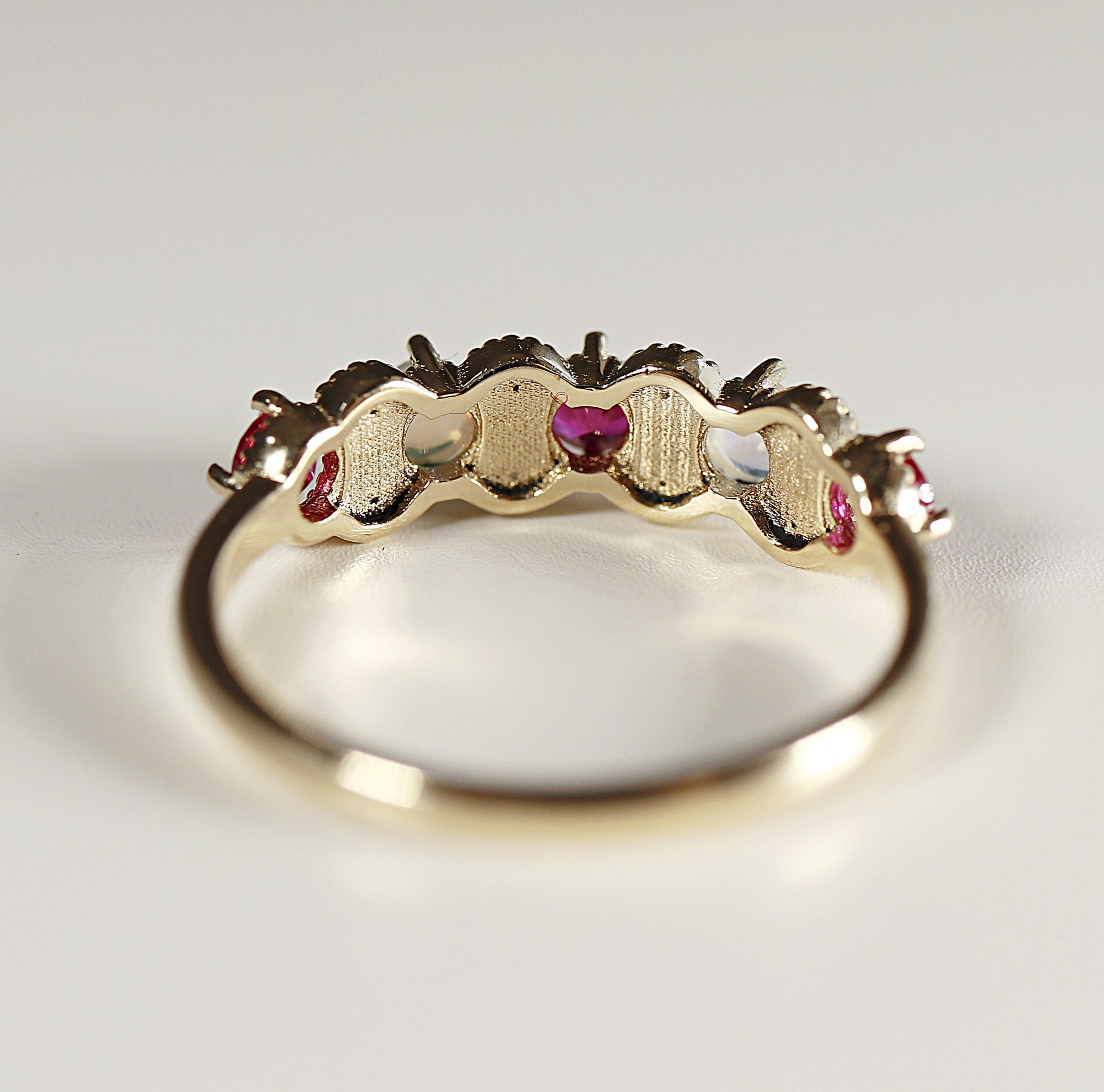 Opal, Ruby and Diamond Half Eternity Ring